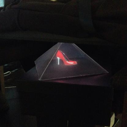 The 3D hologram technology lets customers see and manipulate the shoes they have designed before they are produced. Credit: Shoes of Prey